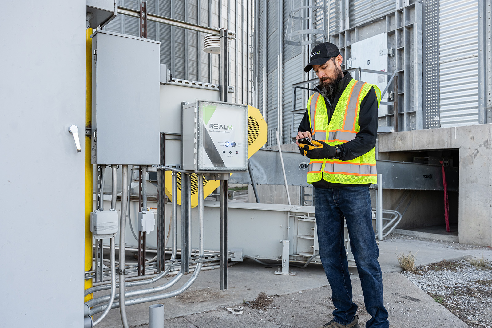 RealmFive Fan Controller with Customer Service checking on fan automation