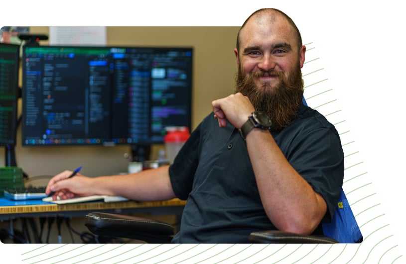 customer service representative at desk smiling